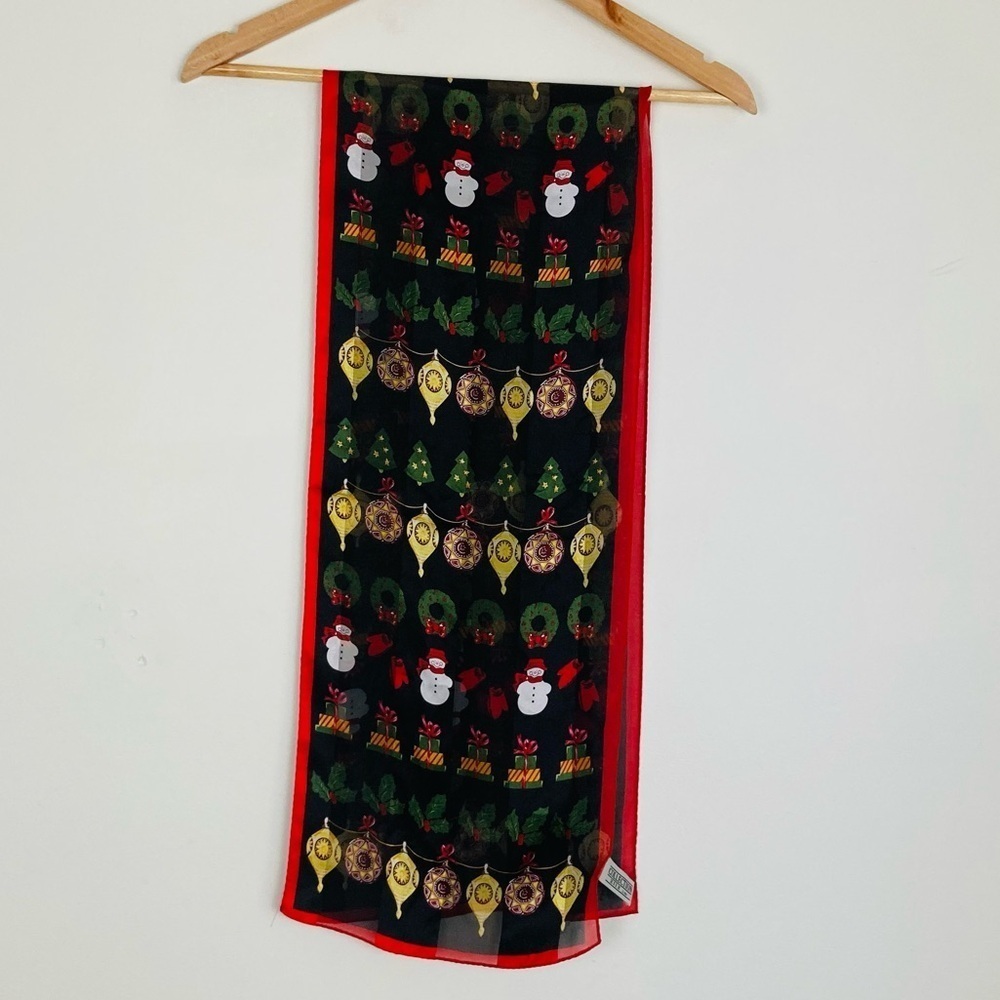 Christmas holiday themed black 100% silk scarf with novelty print.
